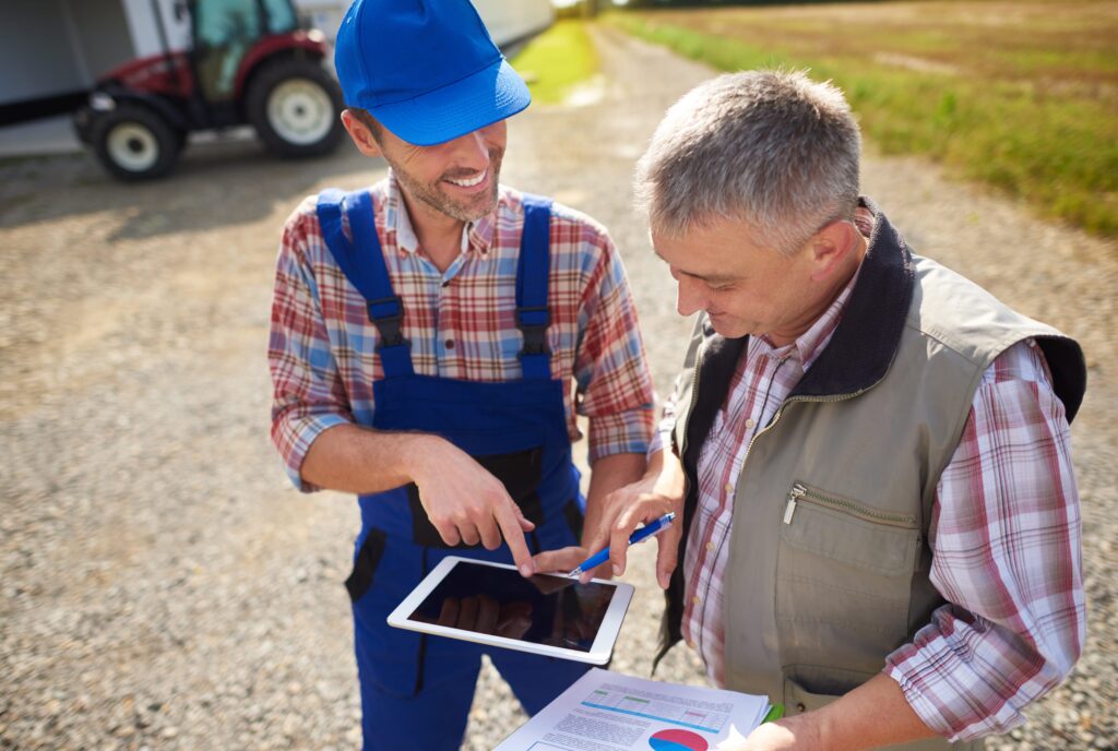 high angle view on modern farmers with digital tab 2026 03 13 04 25 00 utc.gqffOFHA